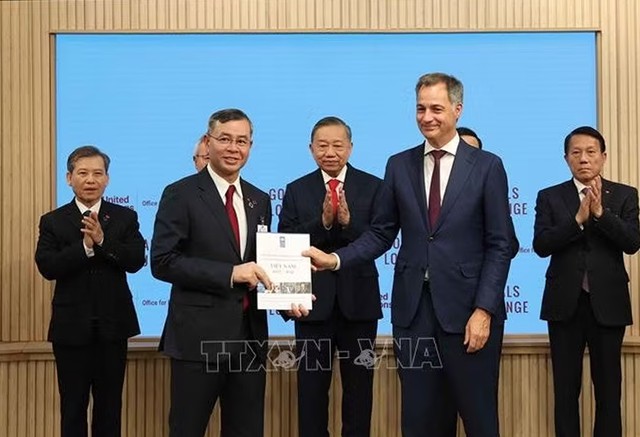 Bộ trưởng Bộ Tài chính nhận 3 Chương trình hợp tác quốc gia Việt Nam giai đoạn 2027-2031 - Ảnh 2.