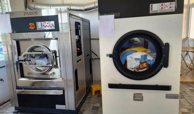 Khởi tố nữ giám đốc ở Hà Tĩnh vụ nâng giá máy giặt từ 2 tỷ lên 12 tỷ đồng bán cho bệnh viện - Ảnh 1.